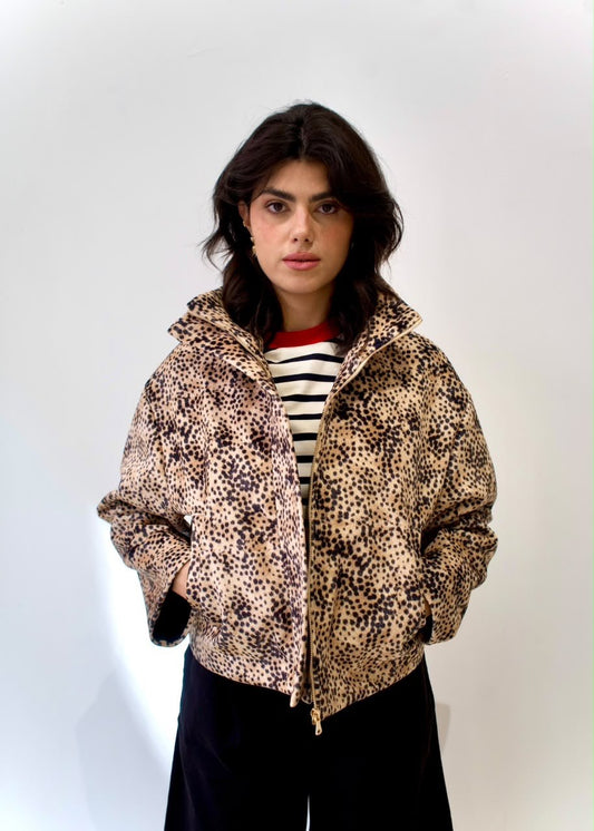 Front styling view of the cheetah-print bomber jacket with raised collar, zip fastening and front pockets